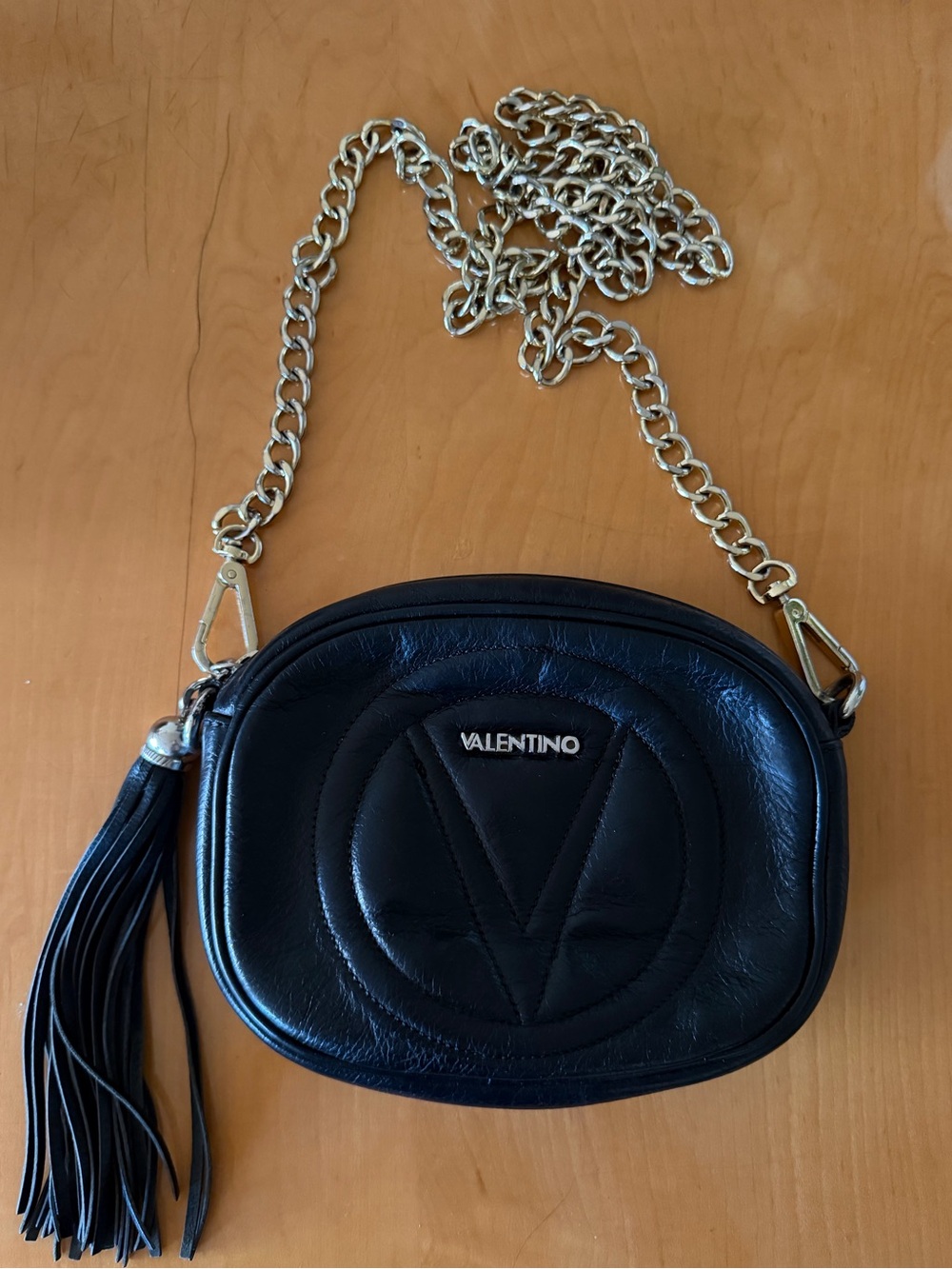 Valentino Black Quilted Oval Leather Crossbody with Tassel and Chain